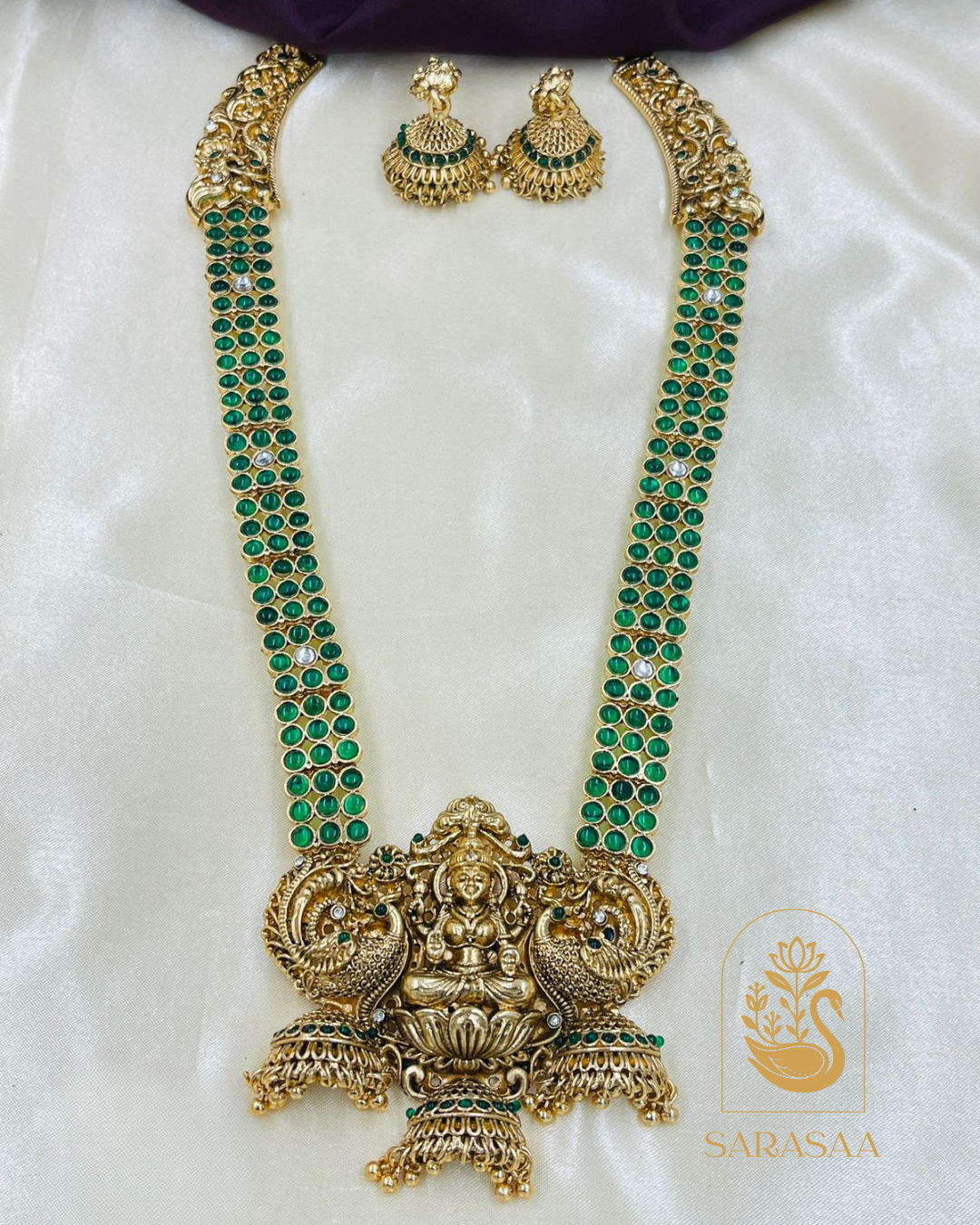 Sarasaa Lakshmi Ruby Green Brass Temple South Indian Long Haram Necklace With Earring Jewellery Set