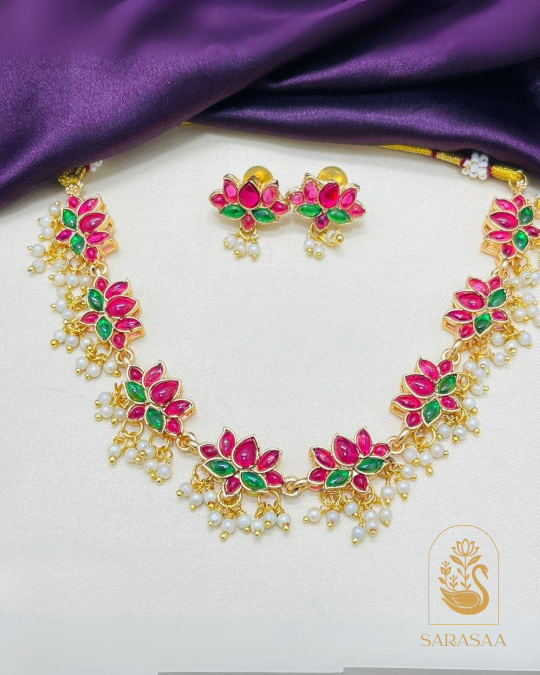 Sarasaa Traditional Matte Gold-Plated Lotus Necklace Set with Ruby-Green Kemp Stones & Pearl Drops