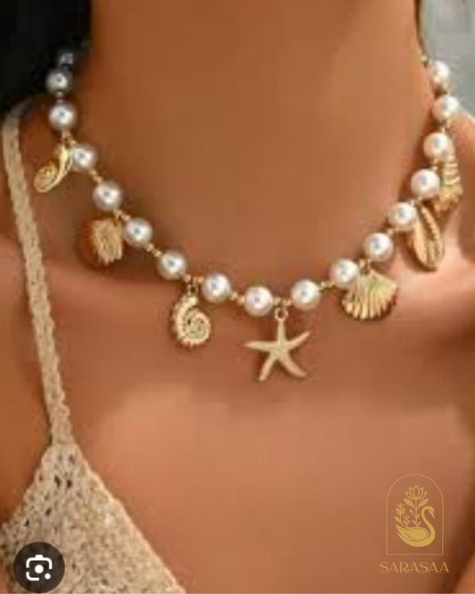 SarasaaFashion Ocean-Inspired Faux Pearl Beaded Necklace with Gold Shell & Starfish Charms  - 145